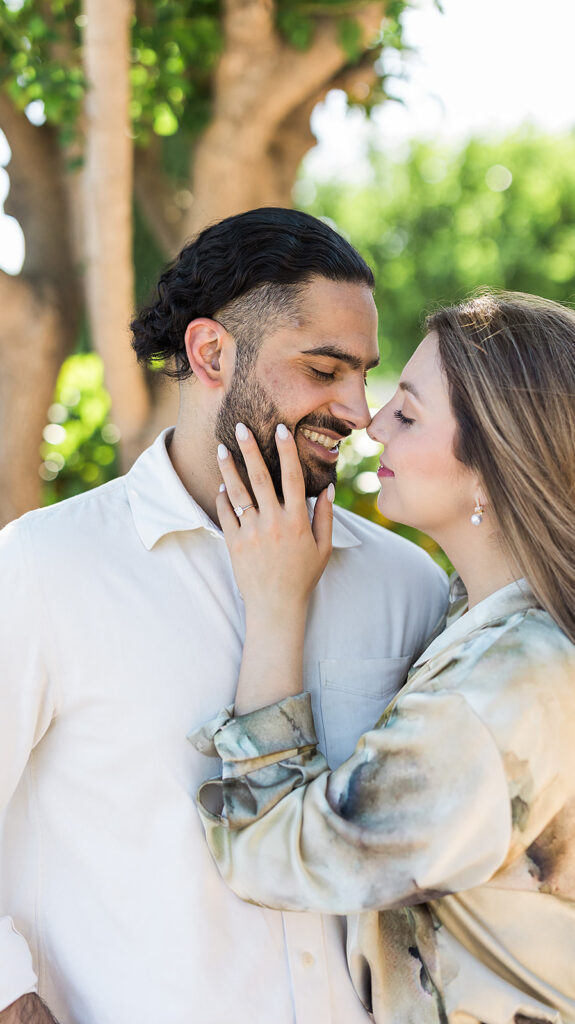 bride stroking groom's cheek