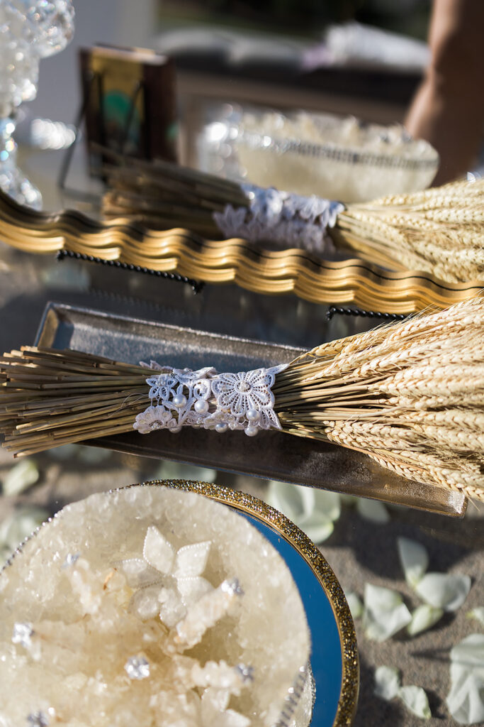 Elegant sofreh aghd with sweets and mirror.