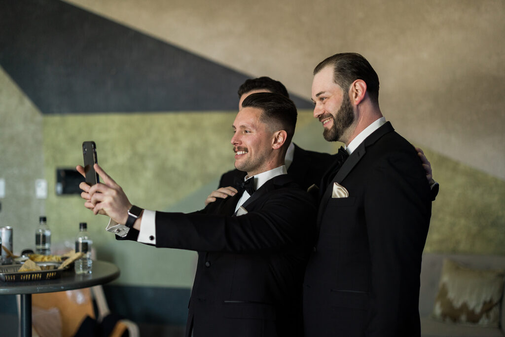bridal party taking selfie